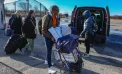 Migrant Families Begin Leaving Floyd Bennett Field in Confusion and Relief