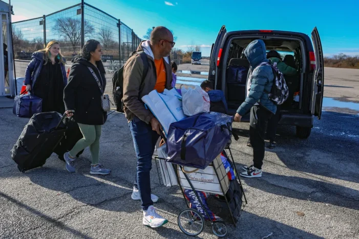 Migrant Families Begin Leaving Floyd Bennett Field in Confusion and Relief