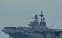 Brooklyn native reviews paperwork aboard USS Tripoli